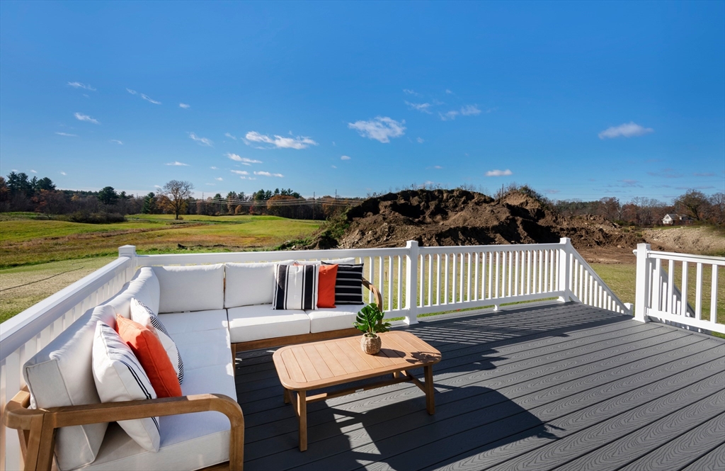 150 County Amherst, NH 03031 - Photo 25 of 26 a view of a balcony with wooden floor and outdoor seating