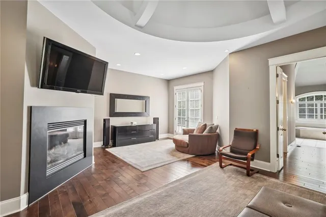 a living room with furniture or fireplace and a flat screen tv