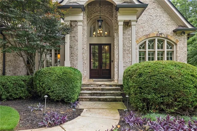 a house view with a garden space