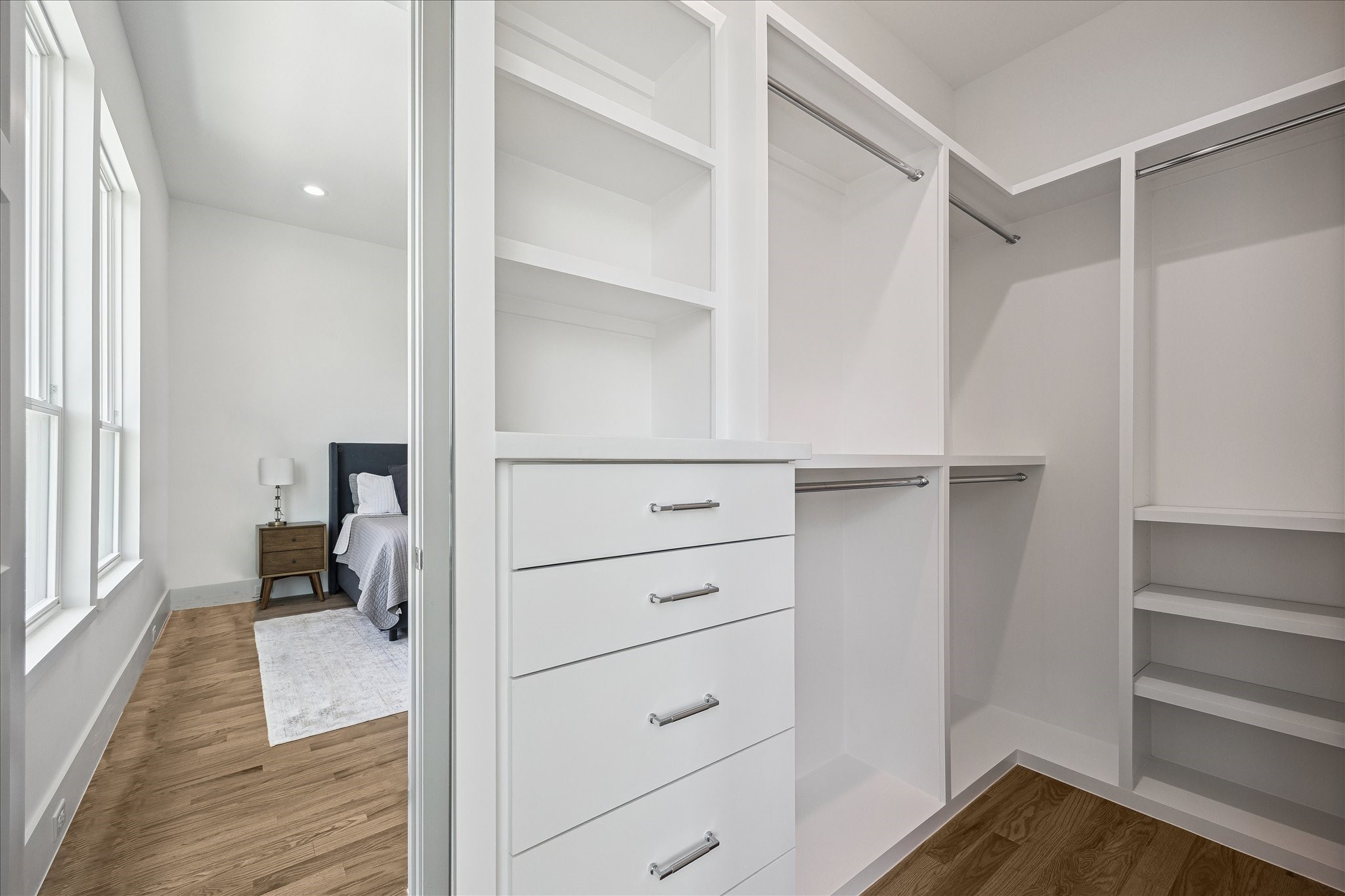 306 Fowler Street Houston, TX 77007 - Photo 18 of 29 Oversized walk-in closet with custom built-ins and exceptional storage.