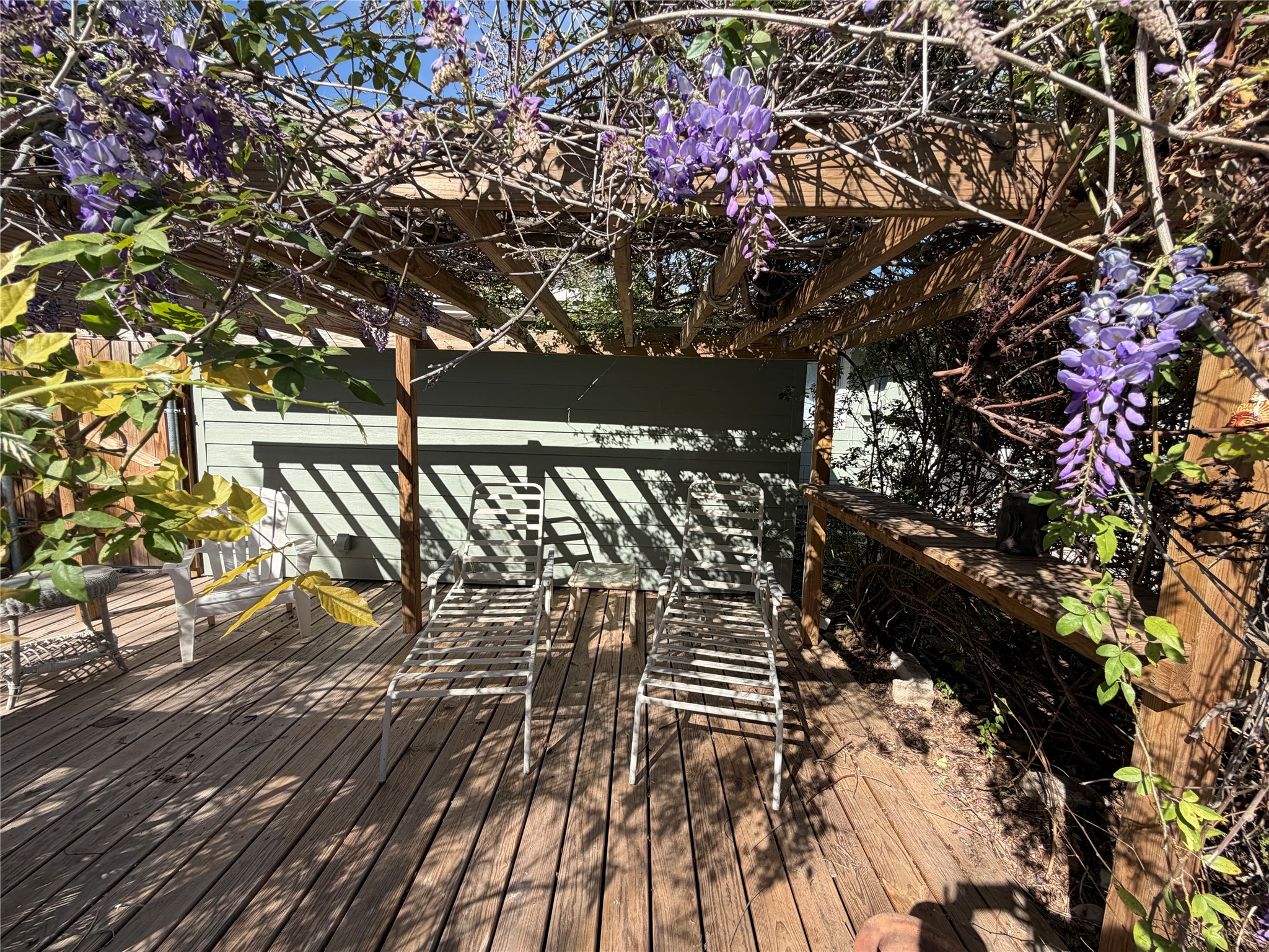 301 Sheraton Avenue Austin, TX 78745 - Photo 21 of 27 Peak inside the natural shaded pergola area near the pool.