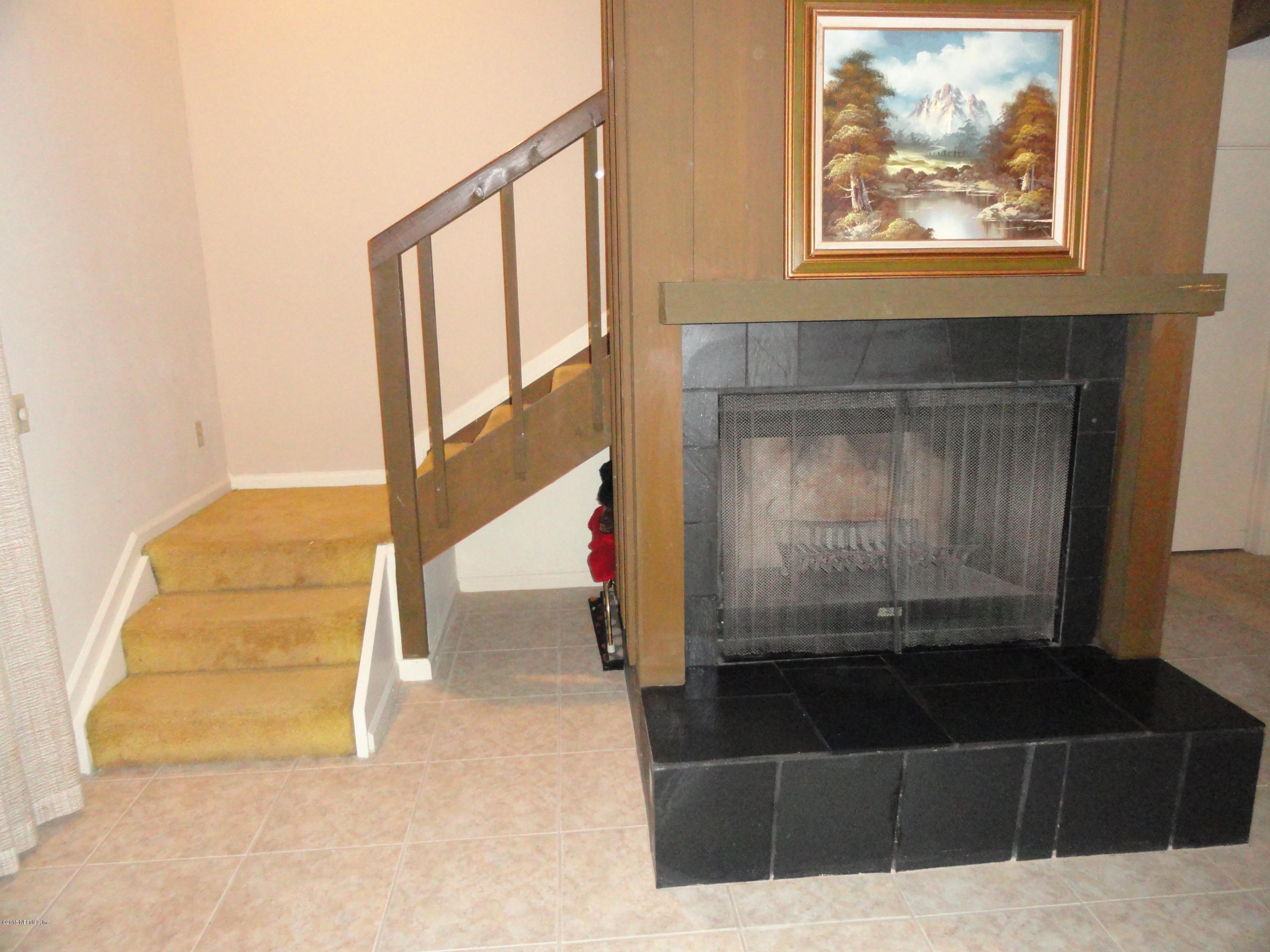 5760 Fort Sumter Road Jacksonville, FL 32210 - Photo 18 of 27 STAIRCASE / FIREPLACE