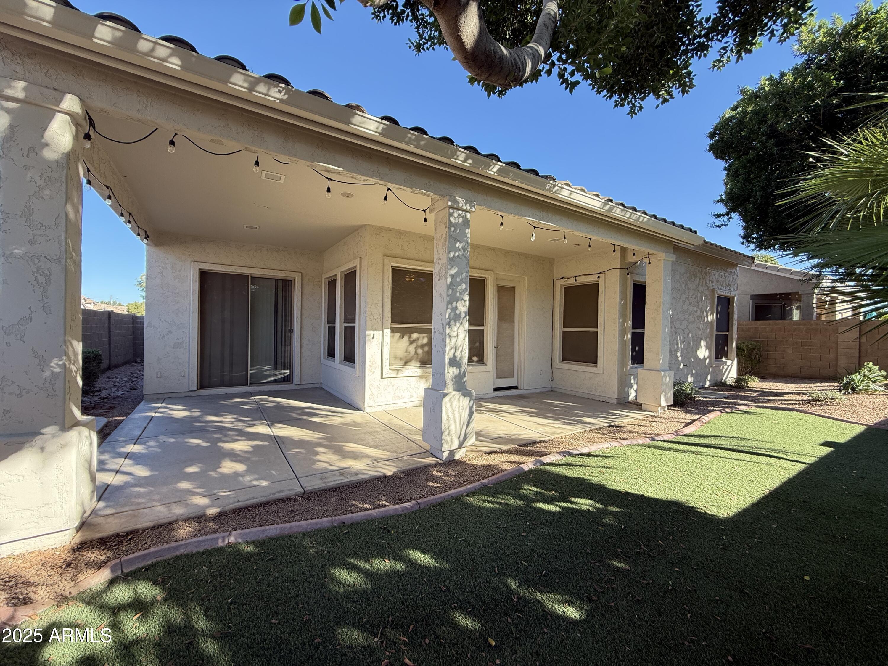 4805 East Wagoner Road Scottsdale, AZ 85254 - Photo 11 of 12 a view of a house with backyard and sitting area