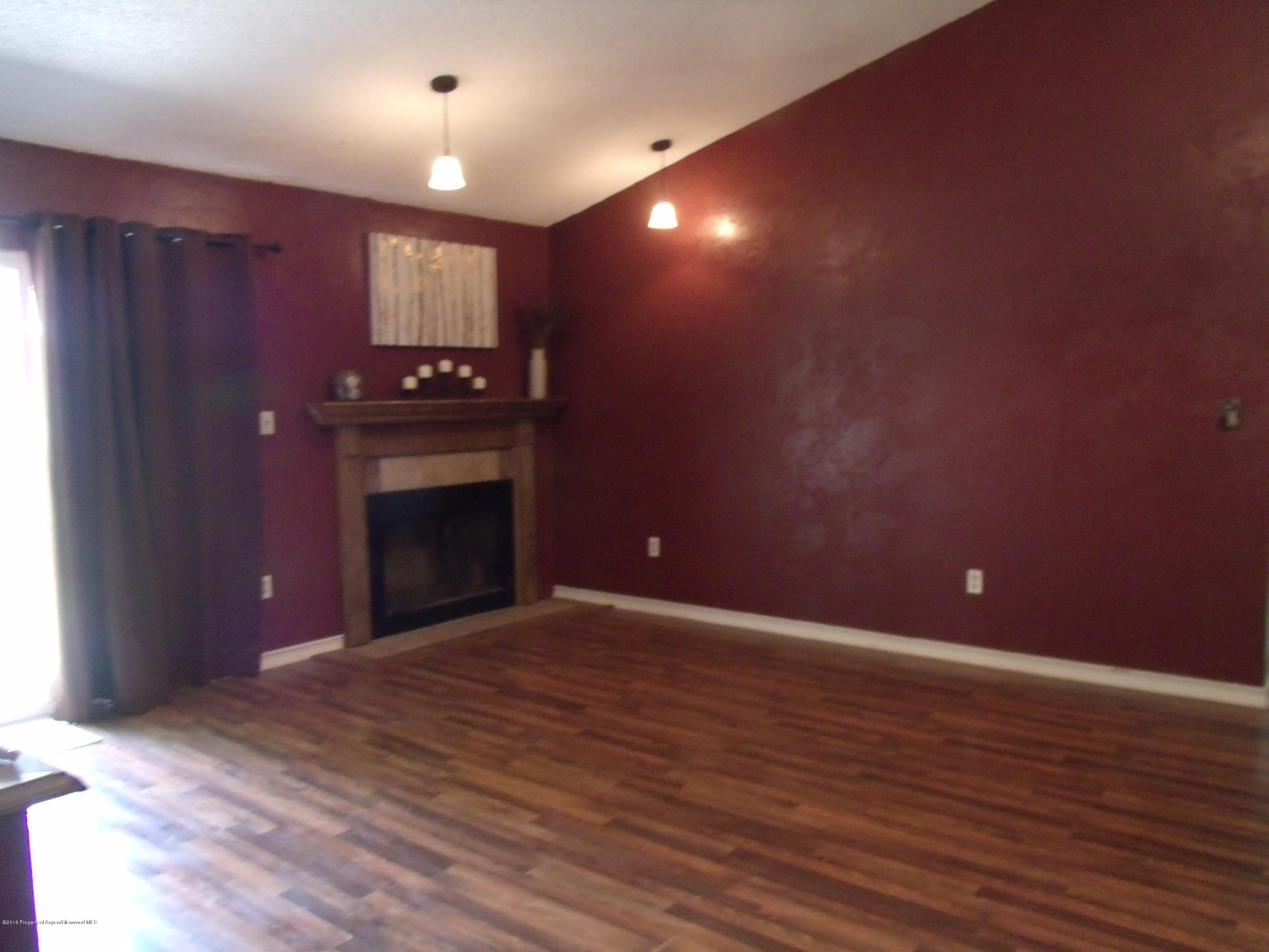 1202 West 5th Street Rifle, CO 81650 - Photo 14 of 14 a view of a livingroom with a fireplace