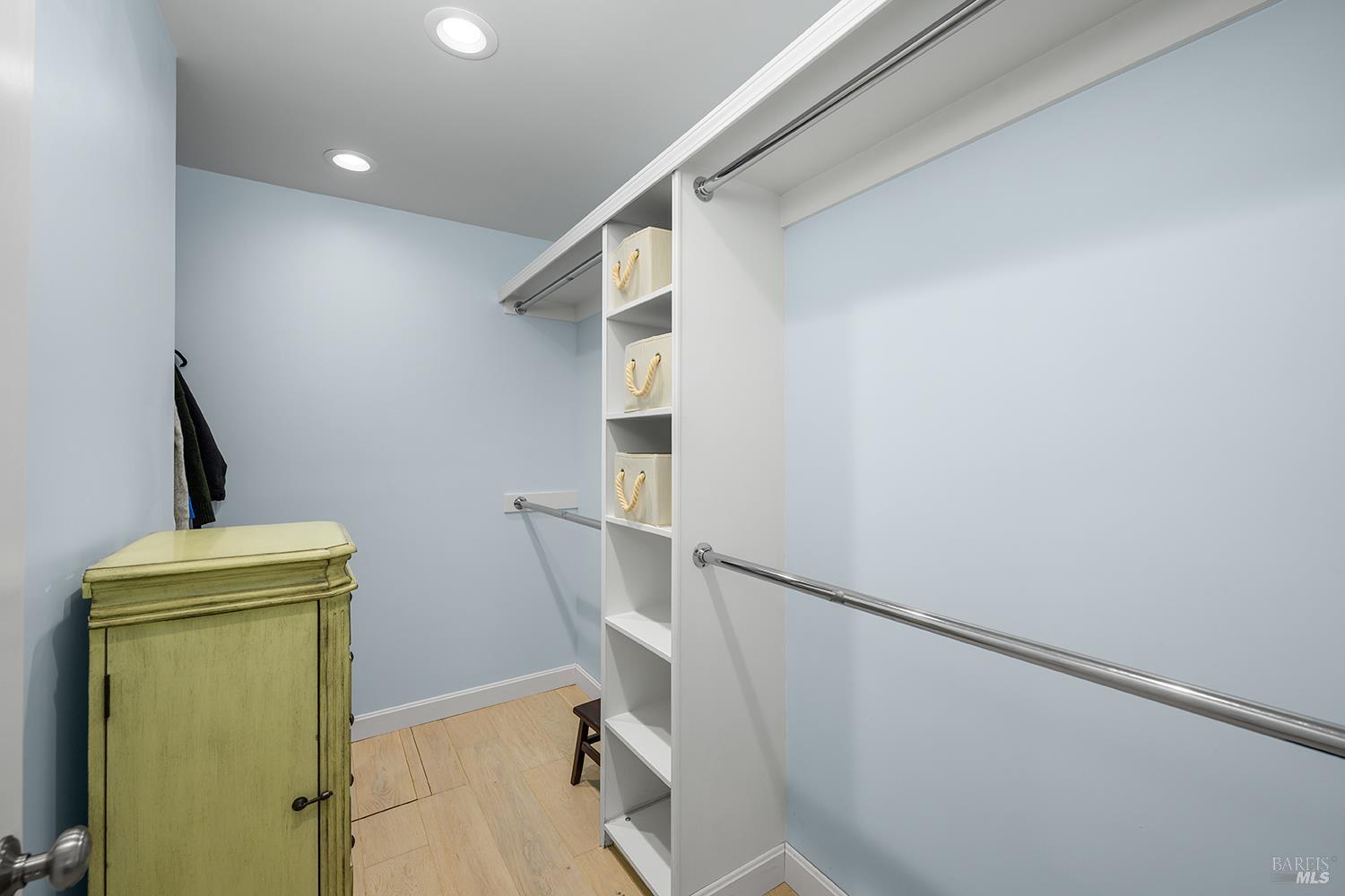 5313 Yerba Buena Road Santa Rosa, CA 95409 - Photo 15 of 34 Generous walk-in closet with built-in shelving provides excellent organization and storage.