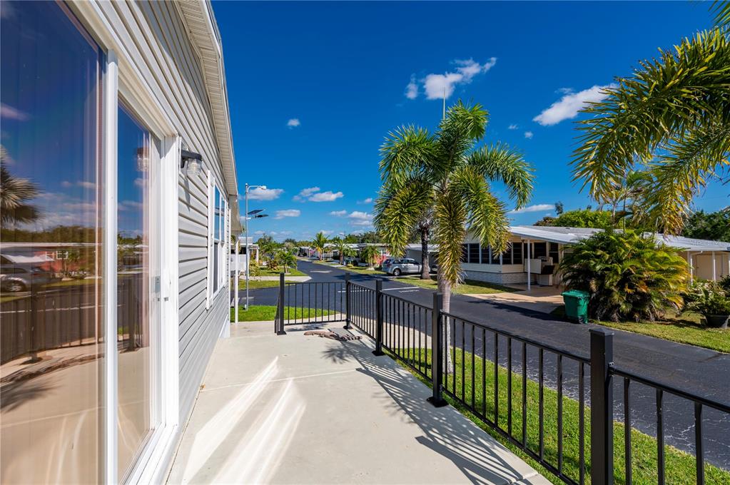 24437 Harbor View Road, Unit 51 Punta Gorda, FL 33980 - Photo 11 of 61 a view of a balcony with chairs