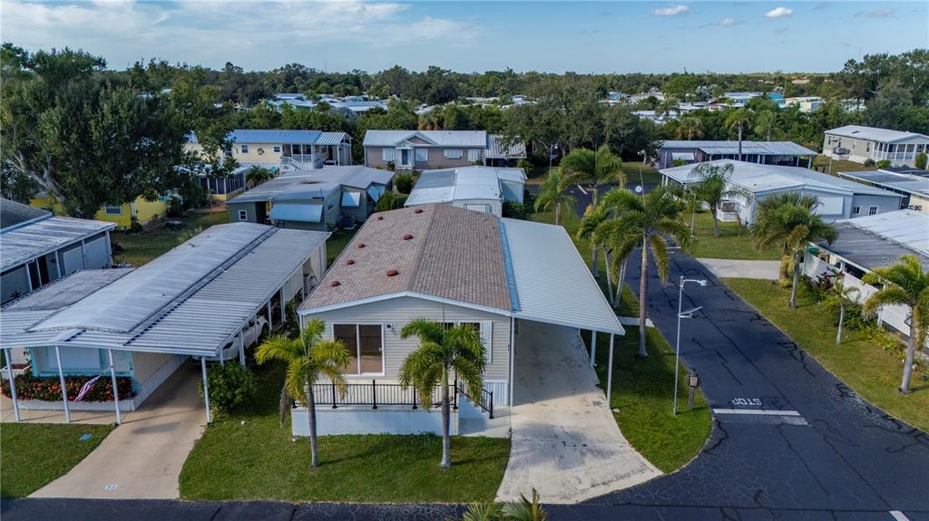24437 Harbor View Road, Unit 51 Punta Gorda, FL 33980 - Photo 38 of 61 an aerial view of a house with a yard