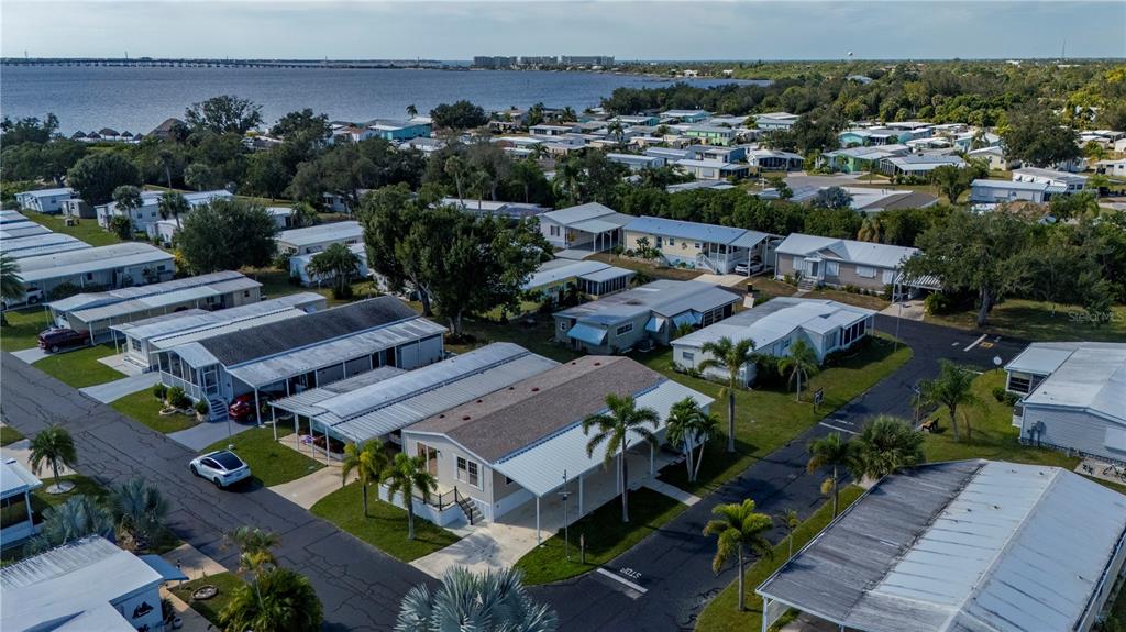 24437 Harbor View Road, Unit 51 Punta Gorda, FL 33980 - Photo 40 of 61 an aerial view of a house with a garden