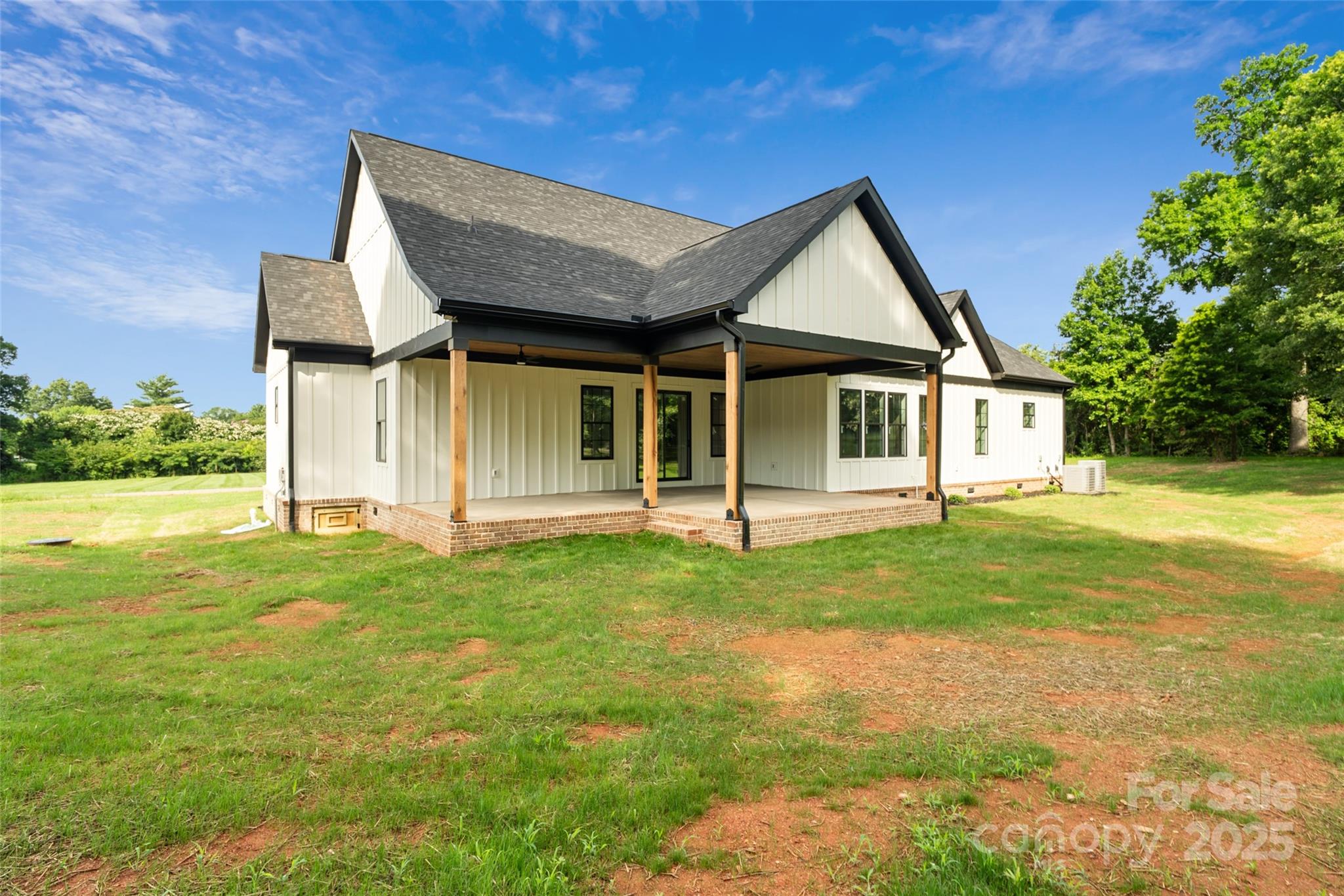 5015 Lancaster Highway Monroe, NC 28112 - Photo 12 of 46 a view of a house with backyard and garden