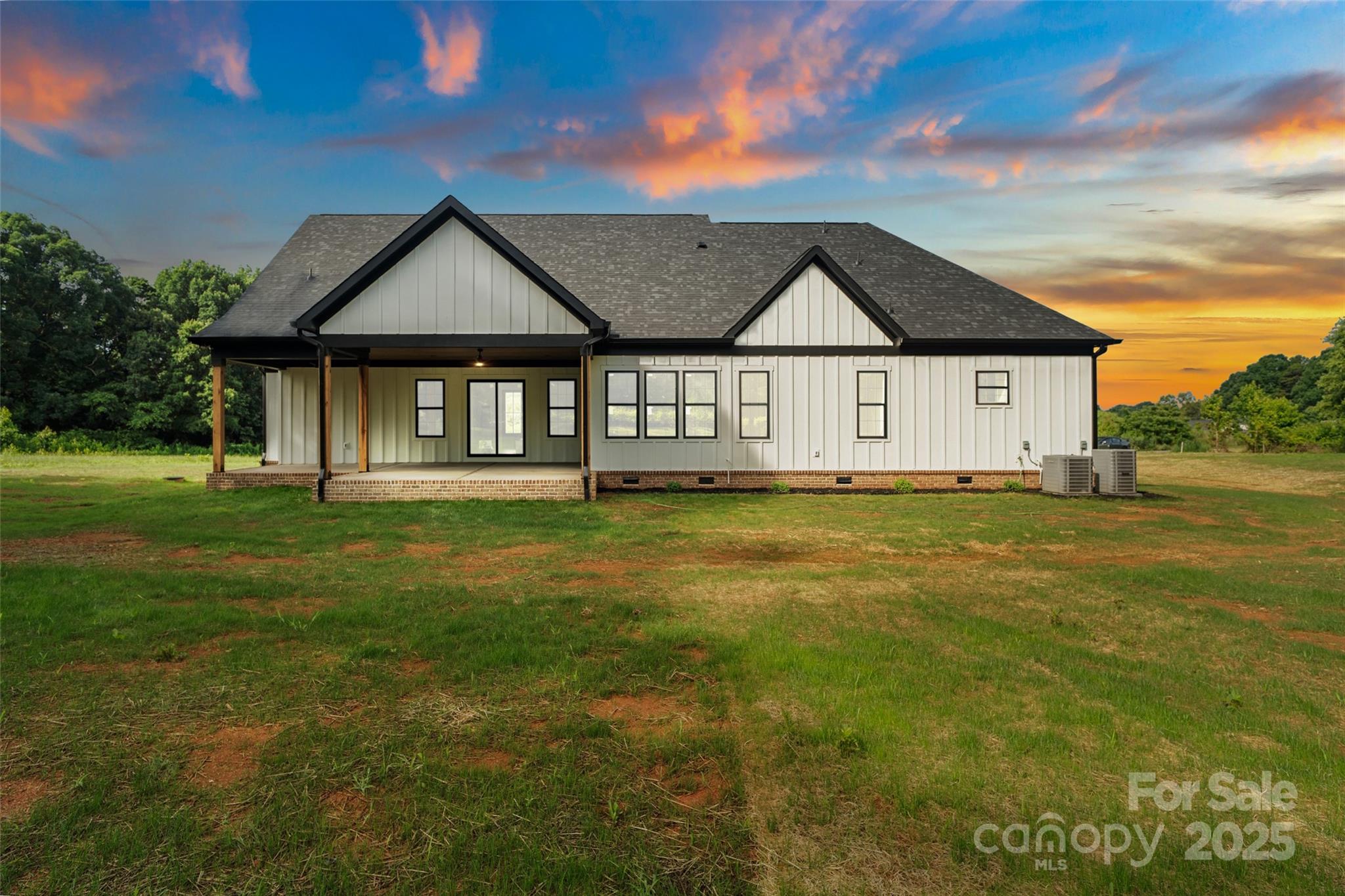 5015 Lancaster Highway Monroe, NC 28112 - Photo 13 of 46 a front view of a house with garden