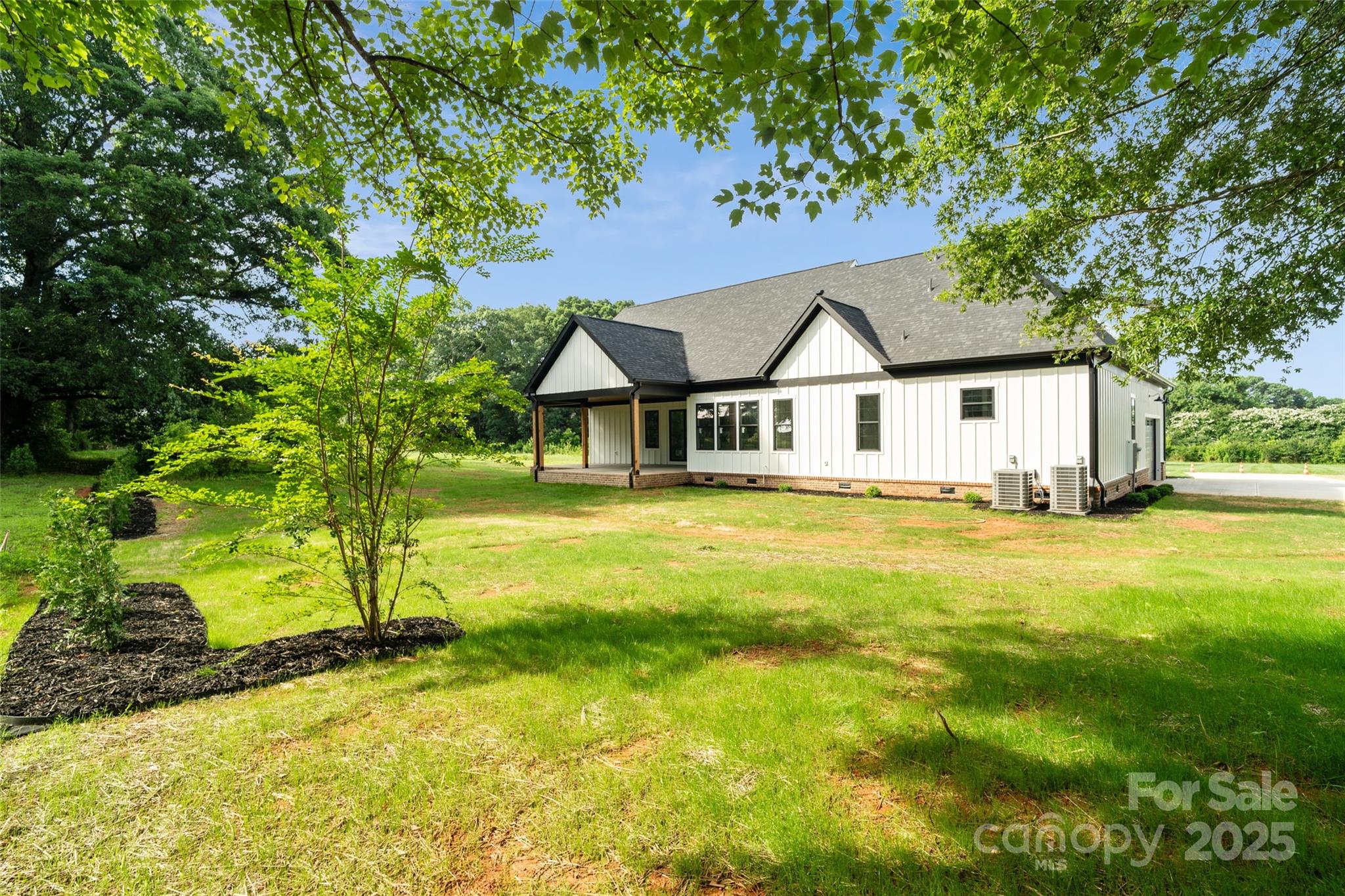 5015 Lancaster Highway Monroe, NC 28112 - Photo 15 of 46 a house with swimming pool in front of it