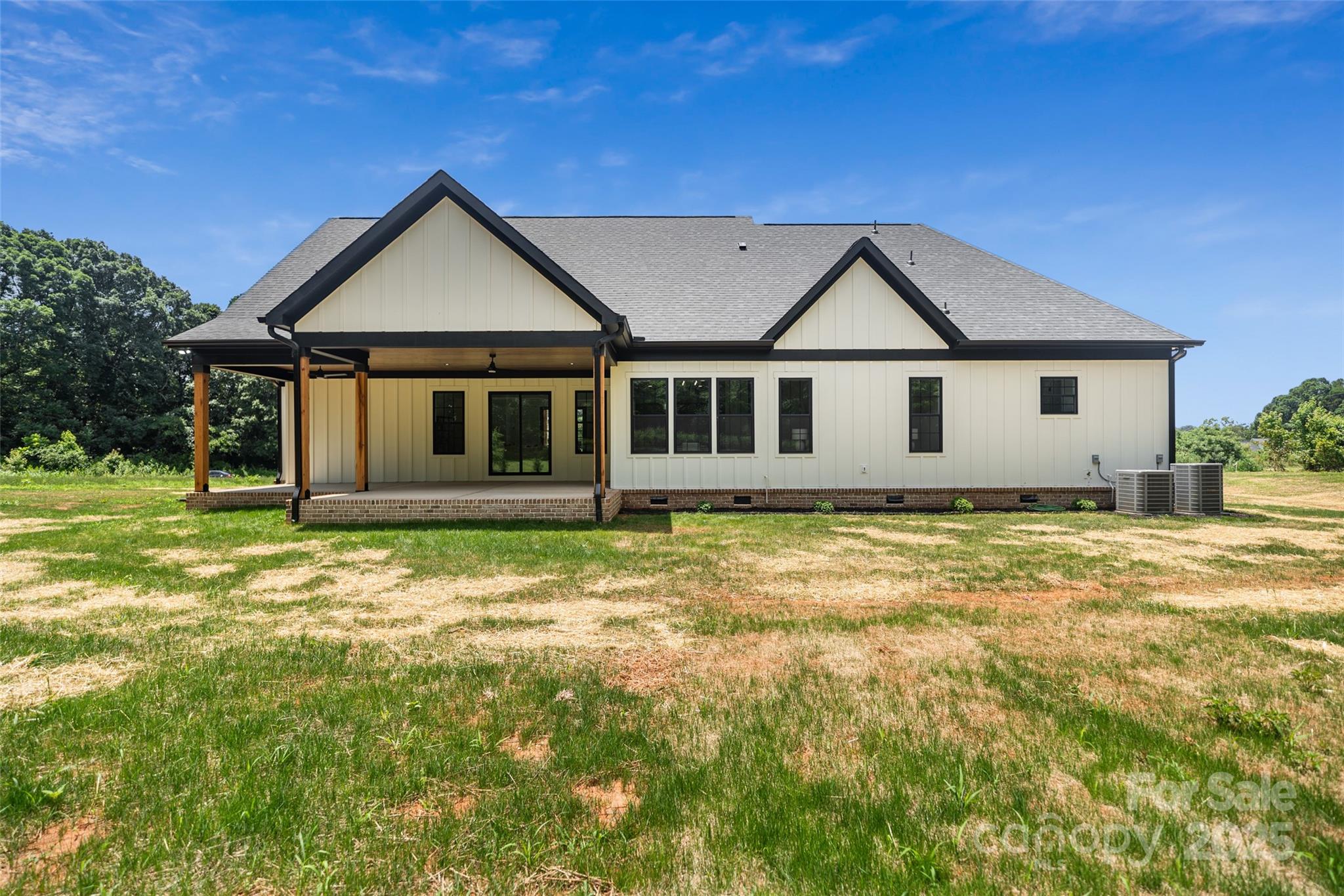 5015 Lancaster Highway Monroe, NC 28112 - Photo 23 of 46 a view of a house with a yard balcony and tree