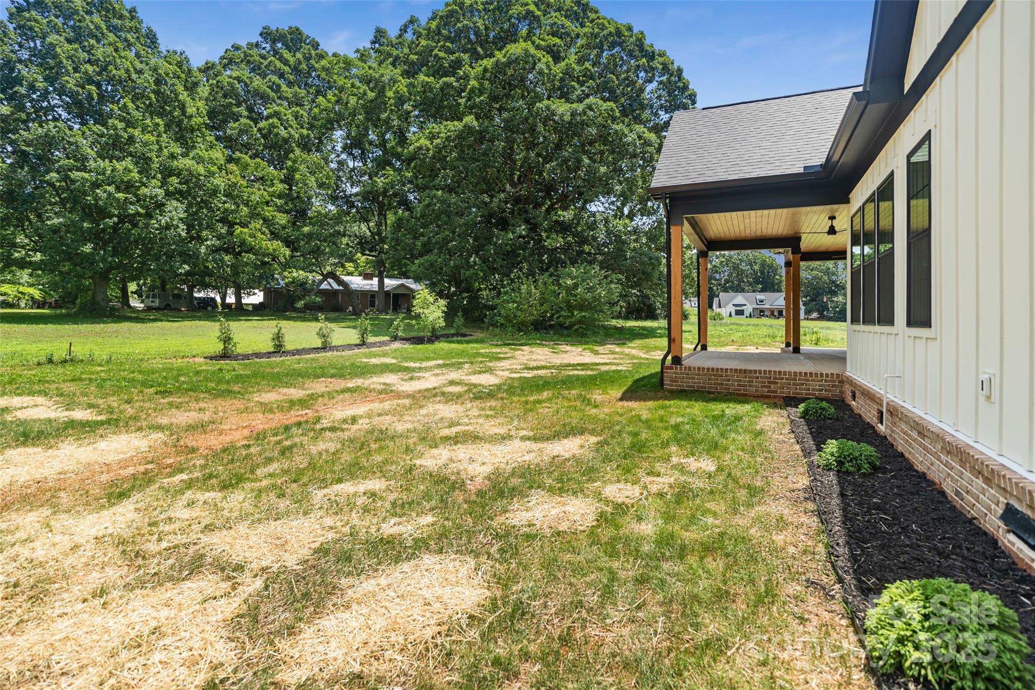 5015 Lancaster Highway Monroe, NC 28112 - Photo 25 of 46 a view of a house with a yard