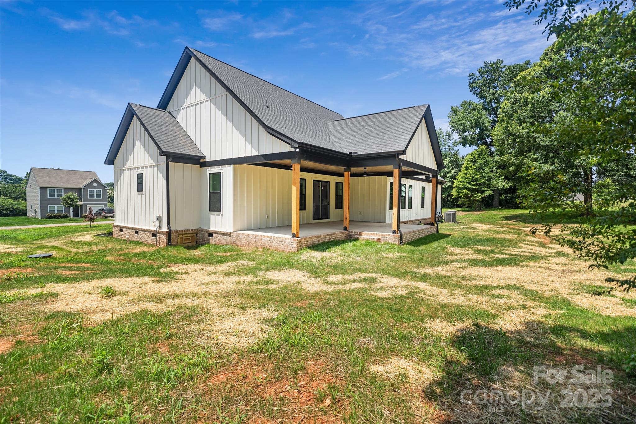 5015 Lancaster Highway Monroe, NC 28112 - Photo 26 of 46 a front view of a house with a yard