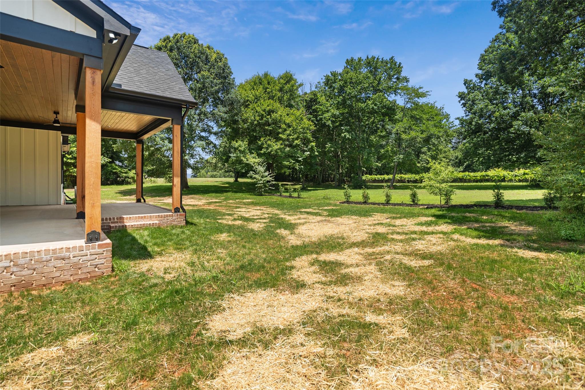 5015 Lancaster Highway Monroe, NC 28112 - Photo 27 of 46 a view of a house with a yard