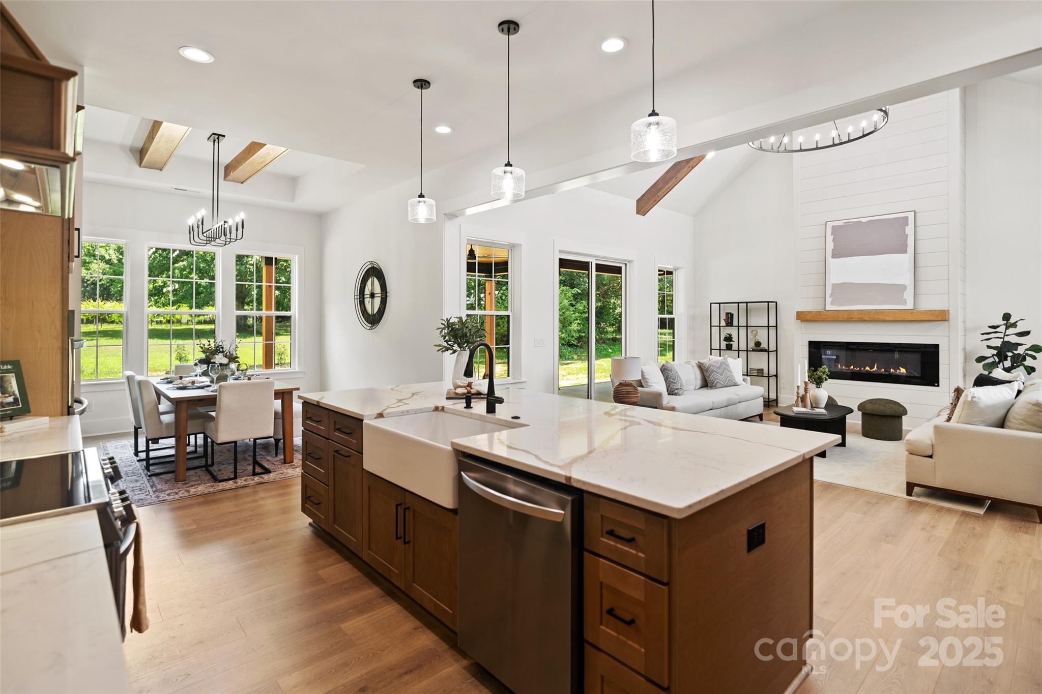 5015 Lancaster Highway Monroe, NC 28112 - Photo 33 of 46 a large white kitchen with a large island in the center