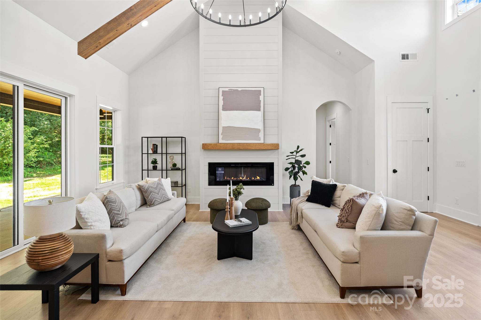 5015 Lancaster Highway Monroe, NC 28112 - Photo 37 of 46 a living room with furniture and a fireplace