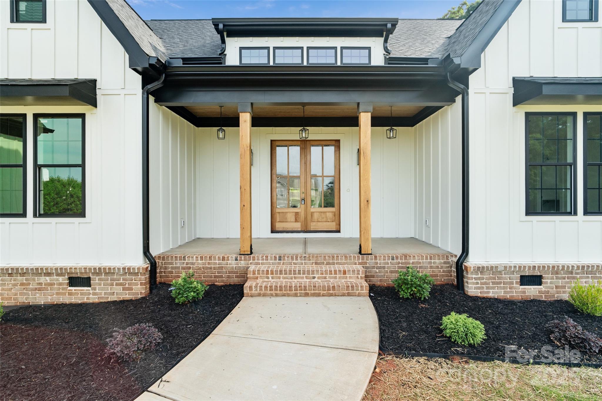 5015 Lancaster Highway Monroe, NC 28112 - Photo 10 of 46 a front view of a house with a yard