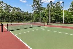 3385 Wooded Lane Conroe, TX 77301 - Photo 6 of 6 a view of a tennis court
