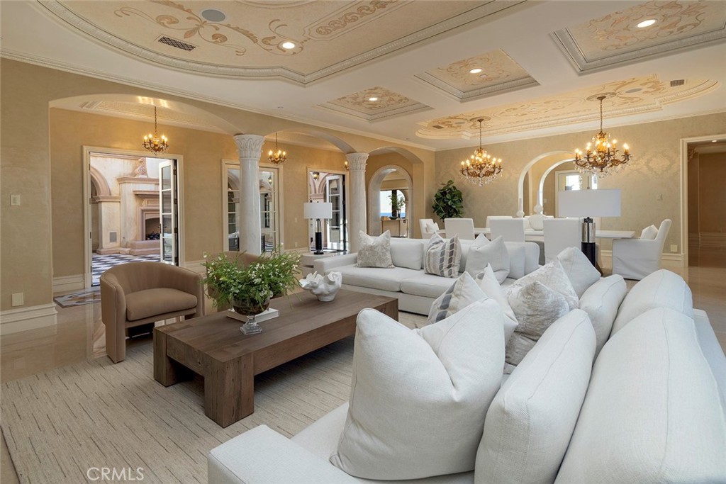 26 Deep Sea Newport Coast, CA 92657 - Photo 13 of 50 a living room with furniture and a large mirror