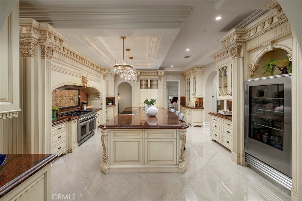 26 Deep Sea Newport Coast, CA 92657 - Photo 16 of 50 a kitchen with a sink stainless steel appliances and cabinets
