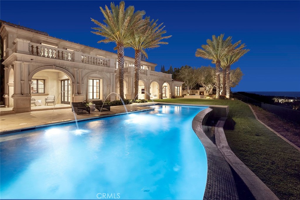 26 Deep Sea Newport Coast, CA 92657 - Photo 18 of 50 a view of a swimming pool with an outdoor seating