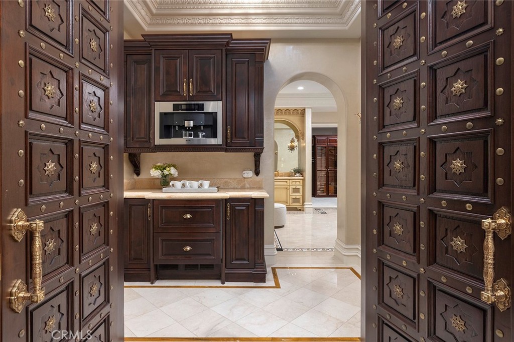 26 Deep Sea Newport Coast, CA 92657 - Photo 26 of 50 a bathroom with a sink a mirror and a shower