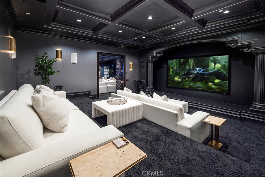 26 Deep Sea Newport Coast, CA 92657 - Photo 31 of 50 a living room with patio furniture and a flat screen tv