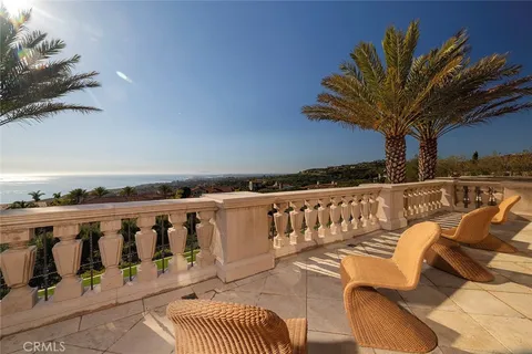 a view of a chairs and table in patio