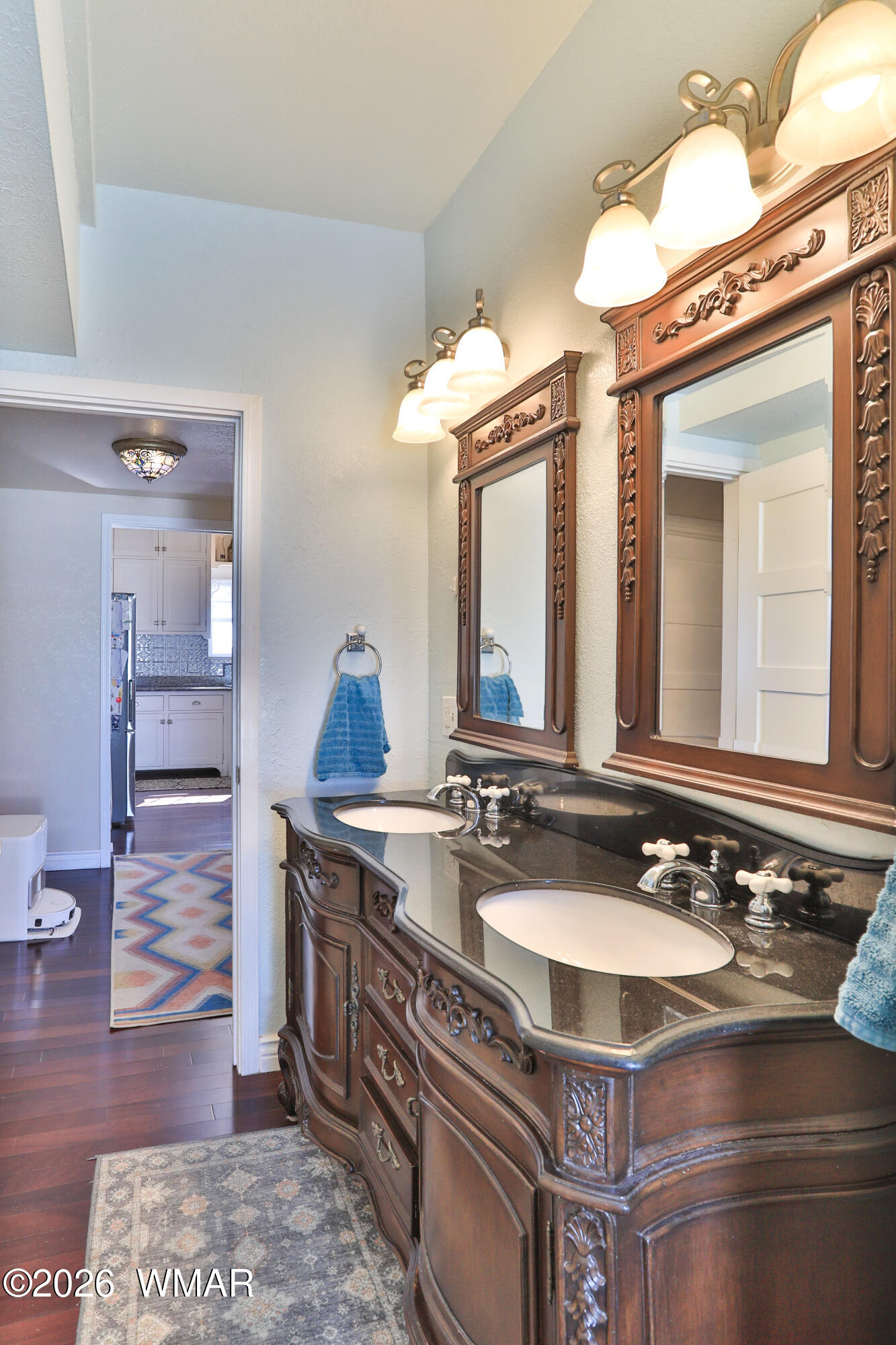 102 Crestview Road Holbrook, AZ 86025 - Photo 25 of 55 a bathroom with a sink and a mirror