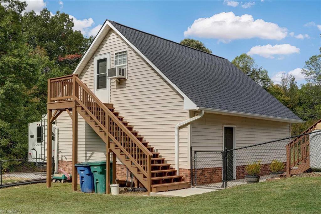 390 Dix Road Ruffin, NC 27326 - Photo 32 of 40 Above garage finished space for storage or hobby room