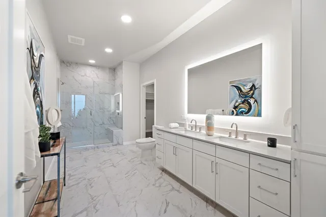 a view of an empty room with a closet