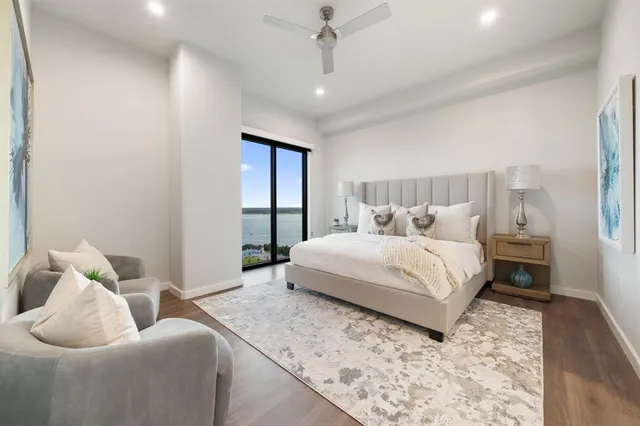 a bathroom with a double vanity sink mirror and shower