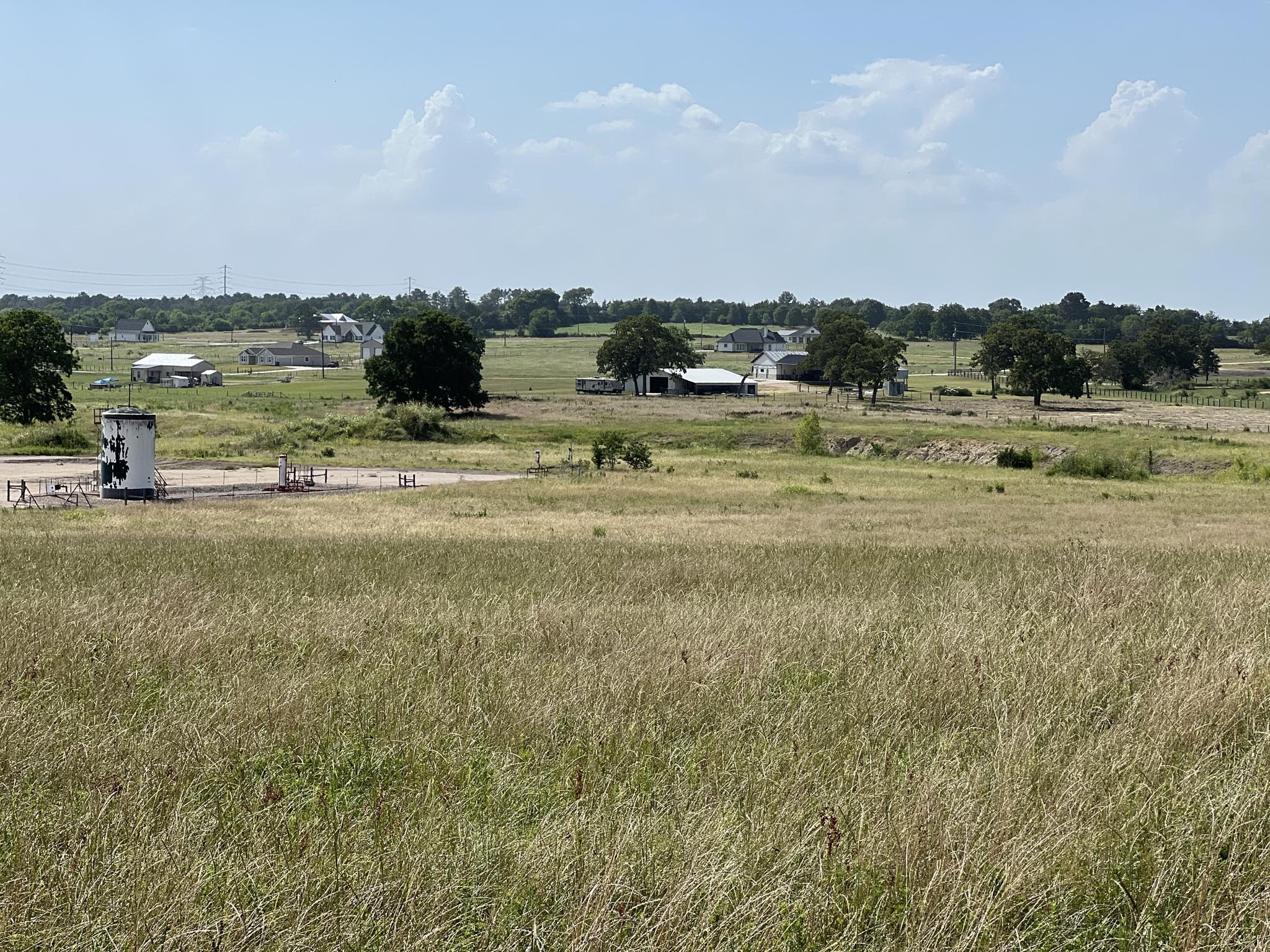5503 Fm 149 Street Anderson, TX 77830 - Photo 3 of 17 a view of a lake with houses in the back