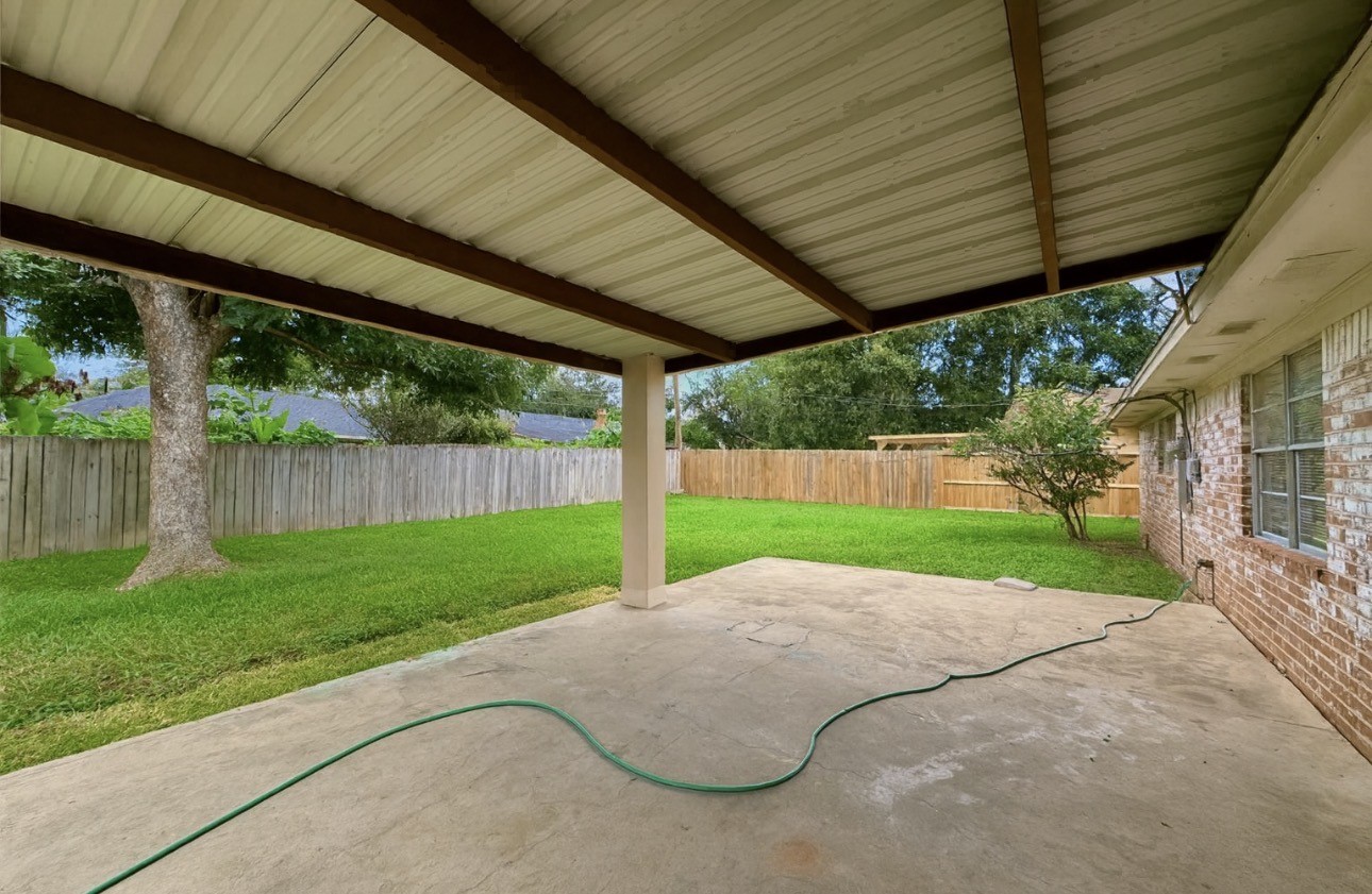9811 Mango Street Houston, TX 77075 - Photo 13 of 14 a view of outdoor space and yard