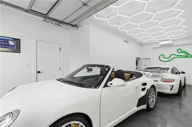 a bedroom with a bed and ceiling fan