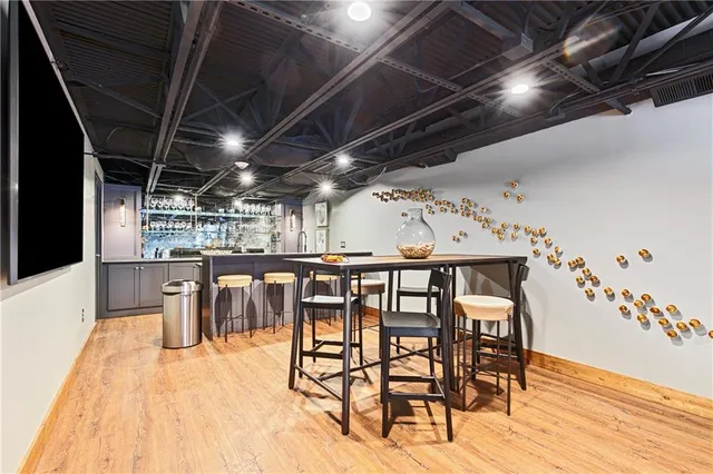 a dining room with furniture wooden floor and entryway
