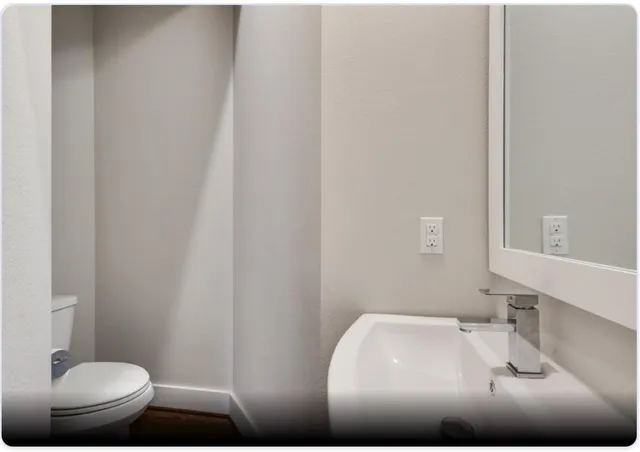 a bathroom with a sink and a toilet