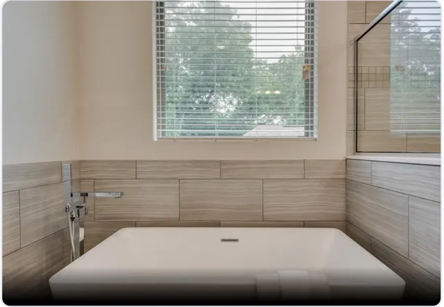 a bathroom with a bathtub