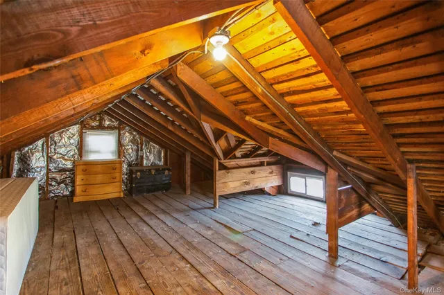 a view of outdoor space with deck and wooden floor