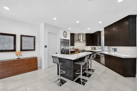 a group of people sitting in a living room