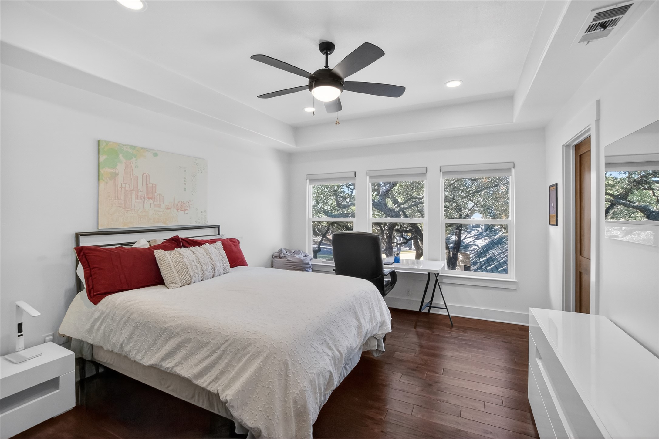 3627 Stoneridge Road, Unit 1 Austin, TX 78746 - Photo 25 of 39 Bedroom with a tray ceiling, dark wood-style flooring, a desk, ceiling fan, and recessed lighting