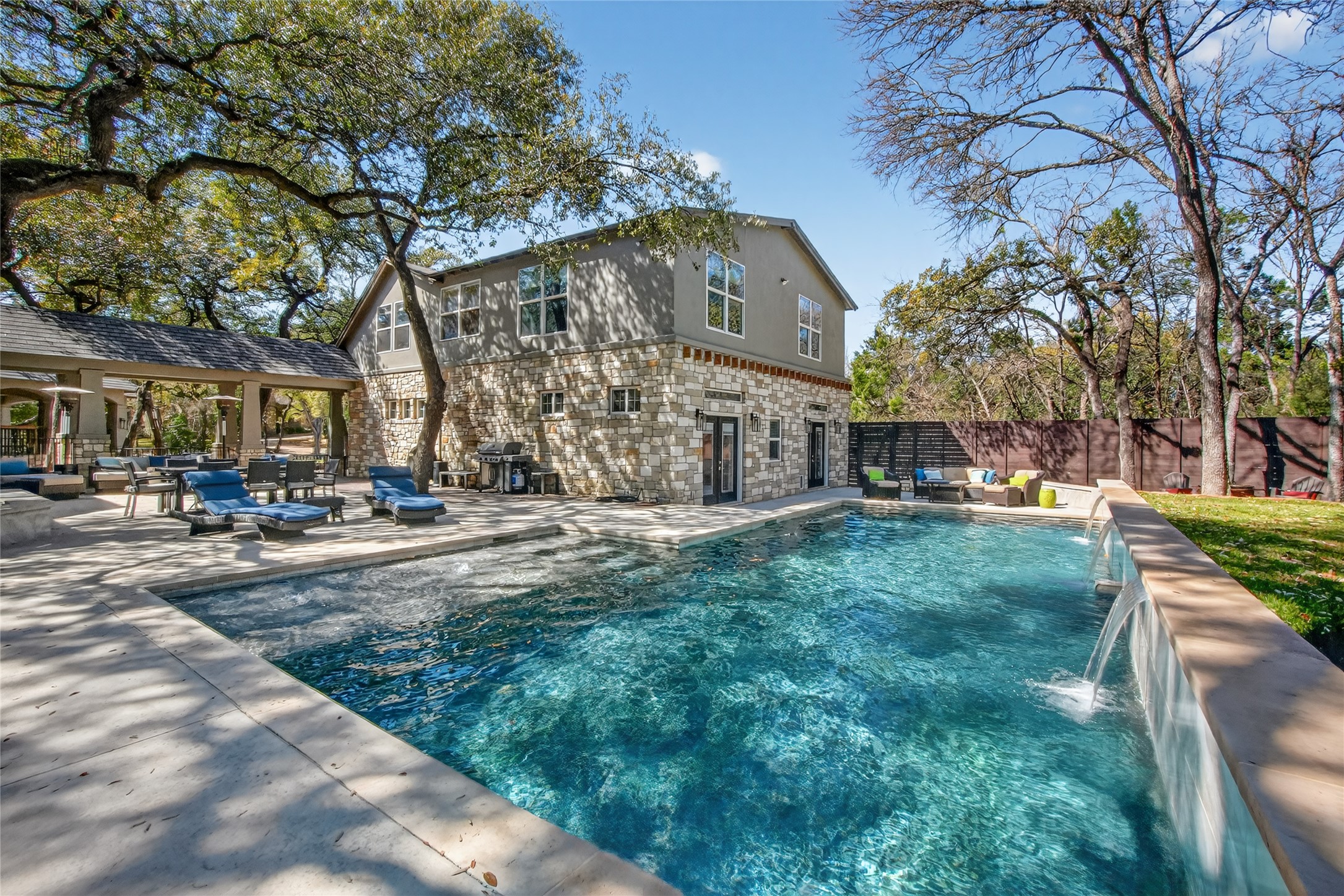 3627 Stoneridge Road, Unit 1 Austin, TX 78746 - Photo 3 of 39 View of pool featuring patio surround and a fenced backyard