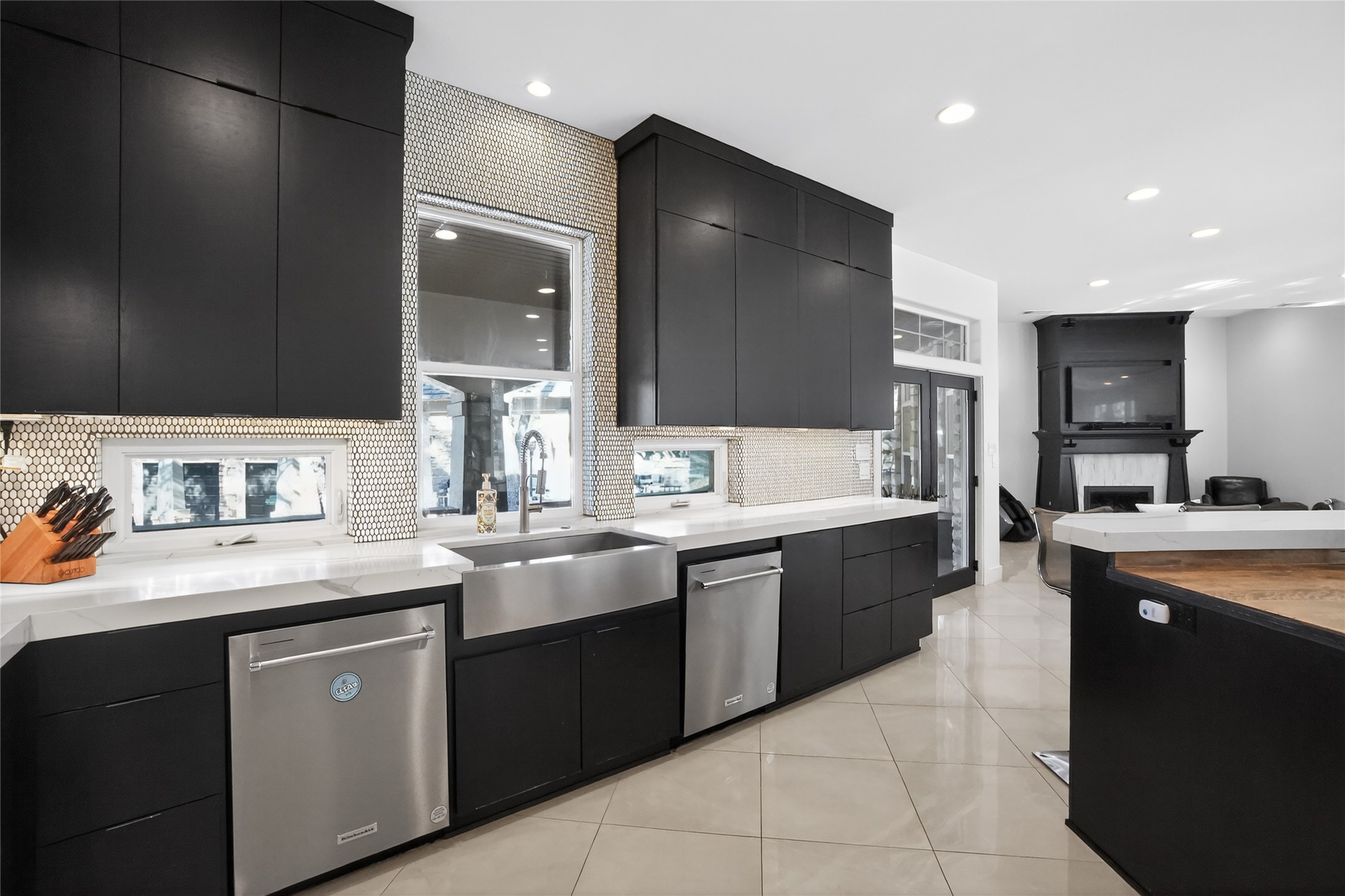 3627 Stoneridge Road, Unit 1 Austin, TX 78746 - Photo 10 of 39 Kitchen featuring dark cabinetry, modern cabinets, and recessed lighting