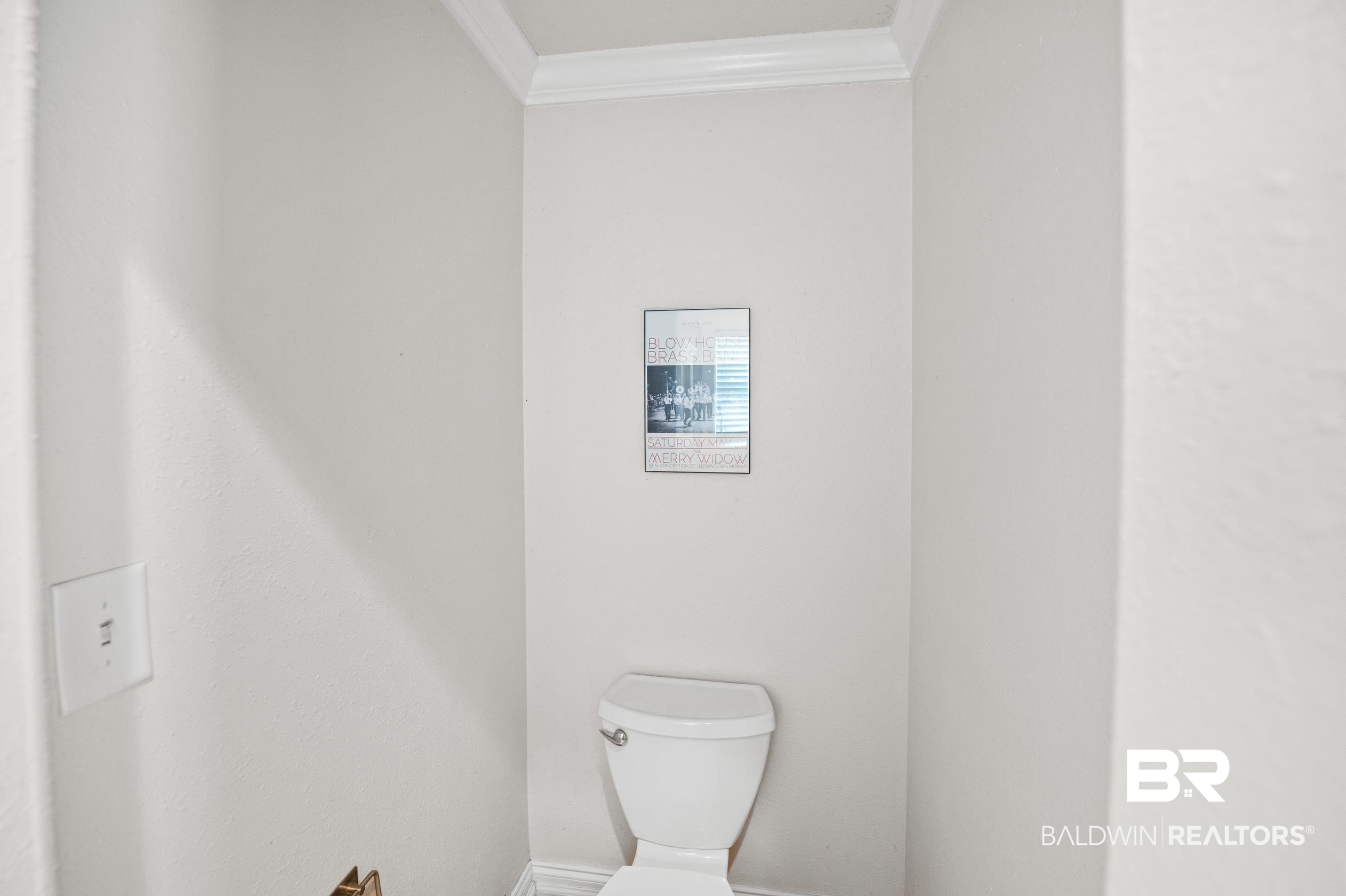 13358 County Road 91 Elberta, AL 36530 - Photo 30 of 47 Bathroom featuring ornamental molding and toilet