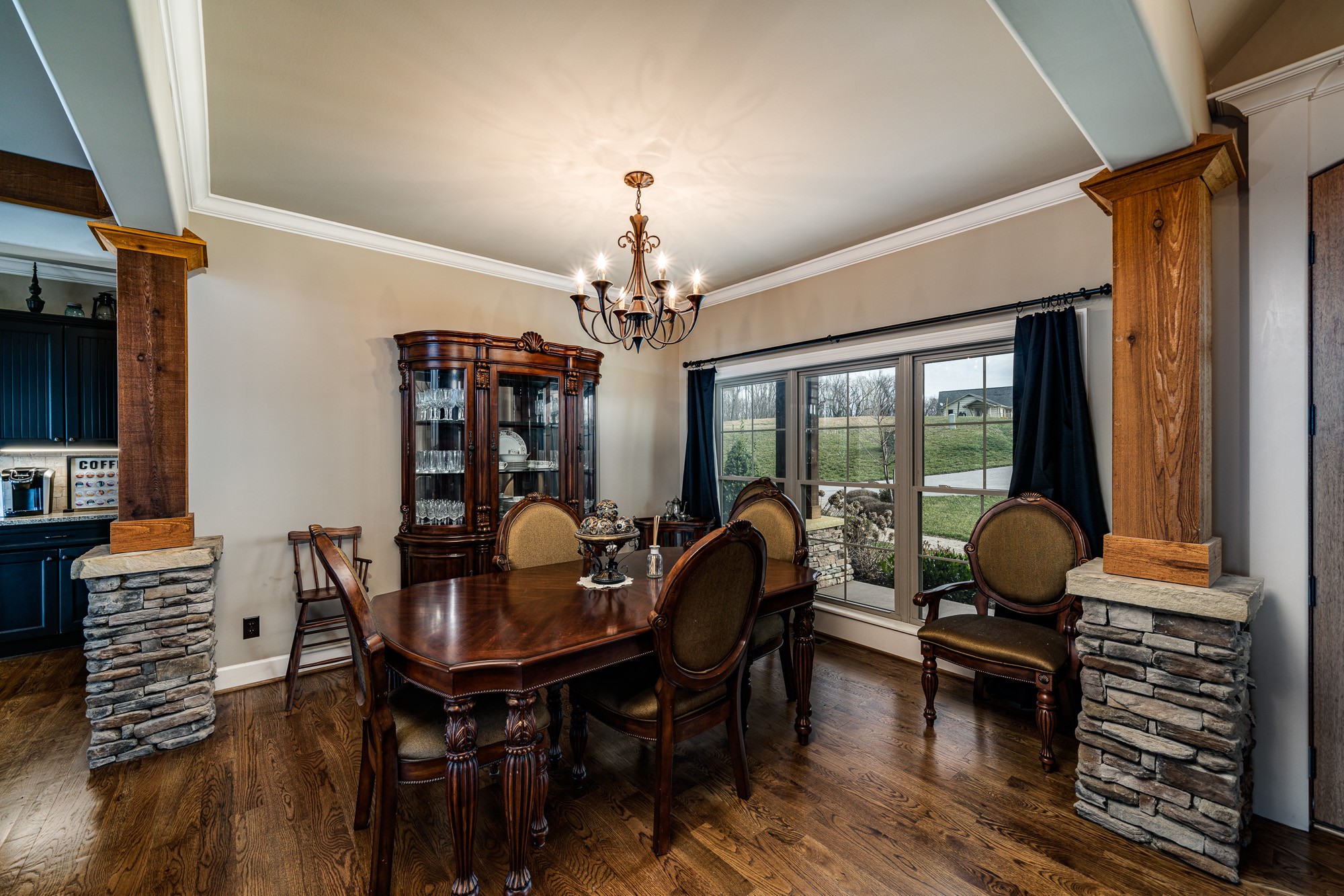 3639 Swan Ridge Road Celina, TN 38551 - Photo 11 of 37 a view of a dining room with furniture wooden floor and chandelier