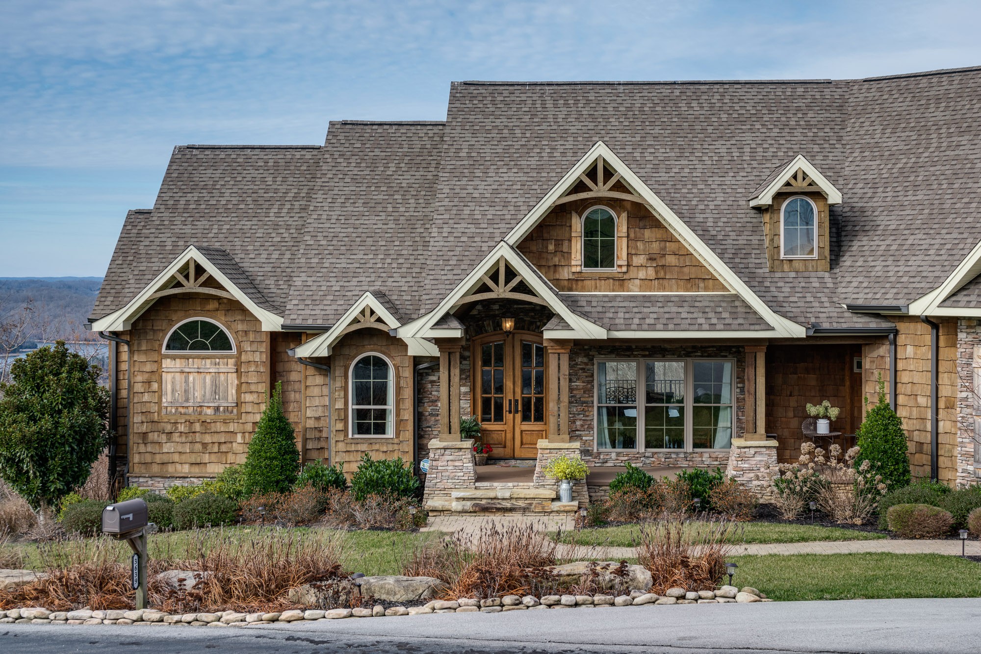 3639 Swan Ridge Road Celina, TN 38551 - Photo 16 of 37 a front view of a house with garden