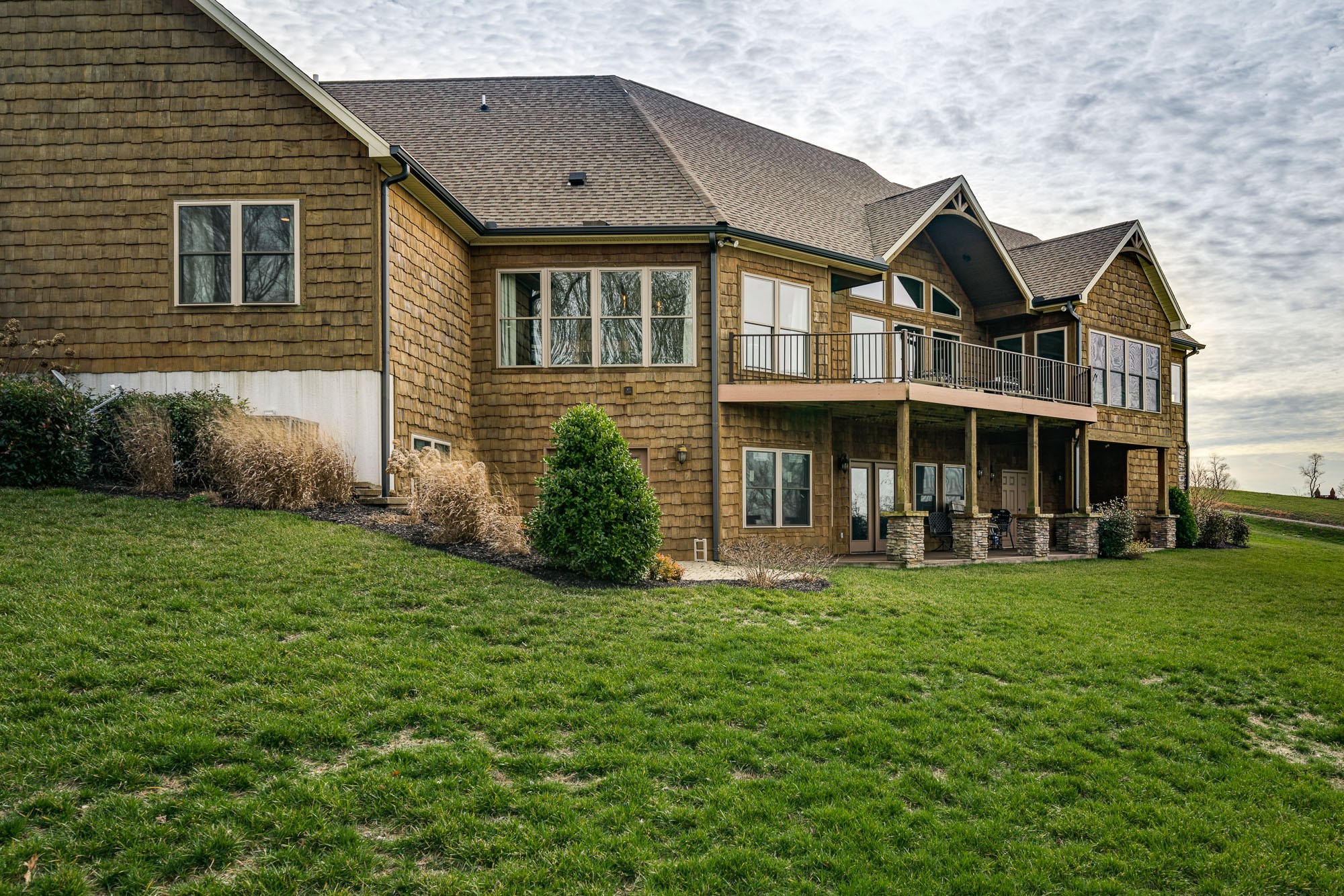 3639 Swan Ridge Road Celina, TN 38551 - Photo 18 of 37 a view of a house with a yard and sitting area