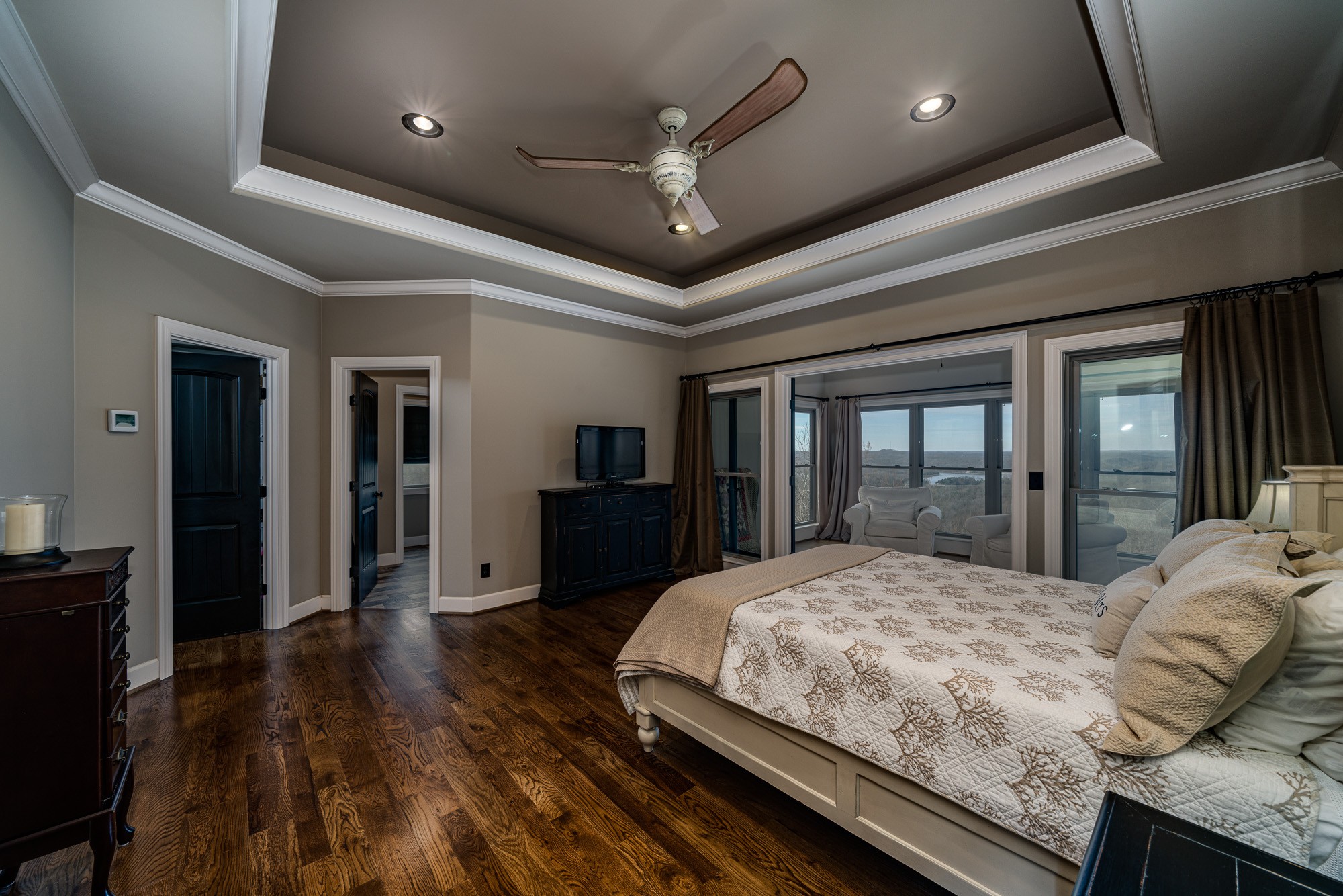 3639 Swan Ridge Road Celina, TN 38551 - Photo 20 of 37 a bedroom with a large bed and a large window