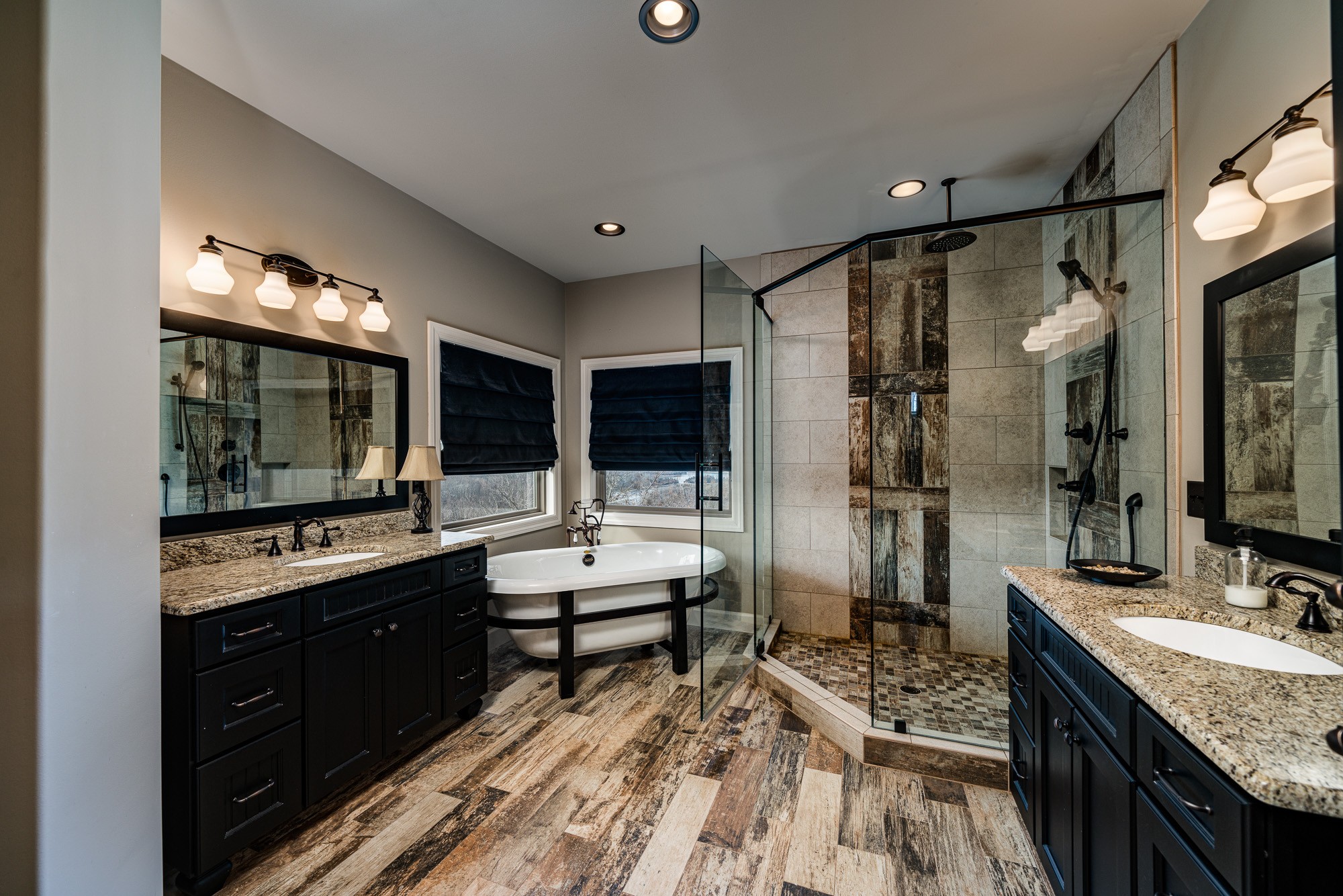 3639 Swan Ridge Road Celina, TN 38551 - Photo 23 of 37 a spacious bathroom with a granite countertop sink mirror and shower